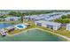 Aerial view of a waterfront community with a pool and a gazebo at 3310 Loveland Blvd # 1502, Punta Gorda, FL 33980