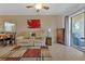 Relaxing living room with patio access and ample natural light at 3310 Loveland Blvd # 1502, Punta Gorda, FL 33980