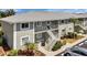 Condo building exterior with stairs and parking at 3310 Loveland Blvd # 1502, Punta Gorda, FL 33980