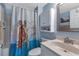 Bathroom with shower/tub combo, vanity, and a sea turtle-themed shower curtain at 3310 Loveland Blvd # 1502, Punta Gorda, FL 33980