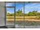 Spacious screened porch with backyard view and plenty of natural light at 3310 Loveland Blvd # 1502, Punta Gorda, FL 33980
