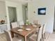 Elegant dining room with a wood table and six chairs at 1160 Belkton Ave, Port Charlotte, FL 33948