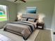 Spacious bedroom with large bed and window at 1160 Belkton Ave, Port Charlotte, FL 33948