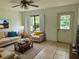 Bright living room with comfortable seating at 1160 Belkton Ave, Port Charlotte, FL 33948