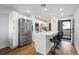 Modern kitchen with stainless steel appliances and white cabinets at 1500 Park Beach Cir # 3C, Punta Gorda, FL 33950