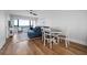 Dining area with table and chairs, open to the kitchen and living room at 1500 Park Beach Cir # 3C, Punta Gorda, FL 33950