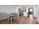 Dining area with table and chairs, open to the kitchen at 1500 Park Beach Cir # 3C, Punta Gorda, FL 33950