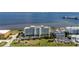 Waterfront condo building with parking and surrounding landscape at 1500 Park Beach Cir # 3C, Punta Gorda, FL 33950