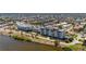 Aerial perspective of waterfront condo building and neighborhood at 1500 Park Beach Cir # 3C, Punta Gorda, FL 33950