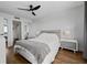 Spacious bedroom with a queen-size bed and direct access to the bathroom at 1500 Park Beach Cir # 3C, Punta Gorda, FL 33950