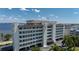 Waterfront building with parking and palm trees at 1500 Park Beach Cir # 3C, Punta Gorda, FL 33950
