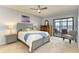 Main bedroom with water views and access to balcony at 1750 Jamaica Way # 113, Punta Gorda, FL 33950