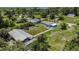 Overhead capture showing the expansive yard, landscaping, and an outbuilding near this lovely home at 27437 Dutch Ave, Punta Gorda, FL 33982