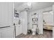 Clean bathroom featuring shower with curtain and stacked washer/dryer at 27437 Dutch Ave, Punta Gorda, FL 33982