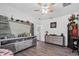Spacious living room features modern shelving and cabinet unit, and wood-look flooring at 27437 Dutch Ave, Punta Gorda, FL 33982