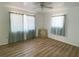 Charming bedroom with light wood flooring and a large closet at 22239 Midway Blvd, Port Charlotte, FL 33952