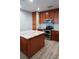 Modern kitchen with island and granite countertops at 87 Vivante Blvd # 8742, Punta Gorda, FL 33950
