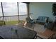 Relaxing balcony with water view and patio furniture at 87 Vivante Blvd # 8742, Punta Gorda, FL 33950