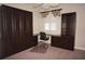 Spacious bedroom with built-in wood cabinets and desk at 87 Vivante Blvd # 8742, Punta Gorda, FL 33950