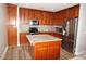 Spacious kitchen with island and wood cabinets at 87 Vivante Blvd # 8742, Punta Gorda, FL 33950