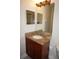 Single sink bathroom vanity with granite countertop at 87 Vivante Blvd # 8742, Punta Gorda, FL 33950