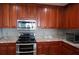 Modern kitchen with stainless steel appliances and granite countertops at 87 Vivante Blvd # 8742, Punta Gorda, FL 33950