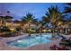 Evening view of the community resort pool at 87 Vivante Blvd # 8742, Punta Gorda, FL 33950