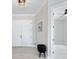Inviting foyer features double doors, light gray flooring, and stylish decor at 13348 Rayburn Ln, Port Charlotte, FL 33981