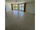 Spacious Gathering room with tile flooring and large windows at 65 Ocean Dr, Punta Gorda, FL 33950