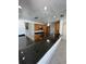 Modern kitchen with granite countertops and stainless steel appliances at 65 Ocean Dr, Punta Gorda, FL 33950