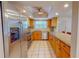Modern kitchen with stainless steel appliances and custom cabinetry at 7263 Sablon Rd, North Port, FL 34291