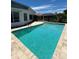 Refreshing turquoise pool and spacious patio at 65 Ocean Dr, Punta Gorda, FL 33950