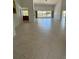 Spacious living room with tile flooring and large windows at 65 Ocean Dr, Punta Gorda, FL 33950