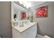 Bathroom with vanity, sink, and large mirror at 150 Harborside Ave # 314, Punta Gorda, FL 33950