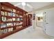 Home office with built-in shelves and bathroom access at 150 Harborside Ave # 314, Punta Gorda, FL 33950