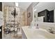Bathroom with shower, vanity, and patterned floor at 150 Harborside Ave # 314, Punta Gorda, FL 33950
