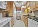 Bright kitchen with ample cabinetry, granite counters, and modern appliances at 150 Harborside Ave # 314, Punta Gorda, FL 33950