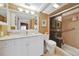 Clean bathroom with a large vanity, shower, and toilet at 150 Harborside Ave # 314, Punta Gorda, FL 33950