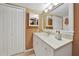 Bathroom with vanity, sink, and shower at 150 Harborside Ave # 314, Punta Gorda, FL 33950