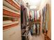 Large walk-in closet with shelving and hanging rods at 150 Harborside Ave # 314, Punta Gorda, FL 33950