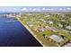 Aerial view of waterfront park with playground, tennis courts, and walking path at 150 Harborside Ave # 314, Punta Gorda, FL 33950