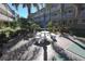 Relaxing patio area with seating and umbrella at 150 Harborside Ave # 314, Punta Gorda, FL 33950