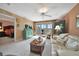 Living room with access to main bedroom and balcony at 150 Harborside Ave # 314, Punta Gorda, FL 33950