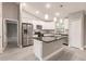Modern kitchen with stainless steel appliances and granite countertops at 820 Bowman Ter, Port Charlotte, FL 33953