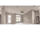 Bright living room with high ceilings and wood-look floors at 820 Bowman Ter, Port Charlotte, FL 33953