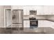 Modern kitchen with stainless steel appliances and granite countertops at 820 Bowman Ter, Port Charlotte, FL 33953