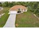New construction home with driveway and lawn at 820 Bowman Ter, Port Charlotte, FL 33953