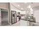 Modern kitchen with stainless steel appliances and granite countertops at 820 Bowman Ter, Port Charlotte, FL 33953