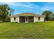 House with screened porch and large backyard at 820 Bowman Ter, Port Charlotte, FL 33953