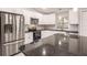 Modern kitchen with stainless steel appliances and granite countertops at 820 Bowman Ter, Port Charlotte, FL 33953